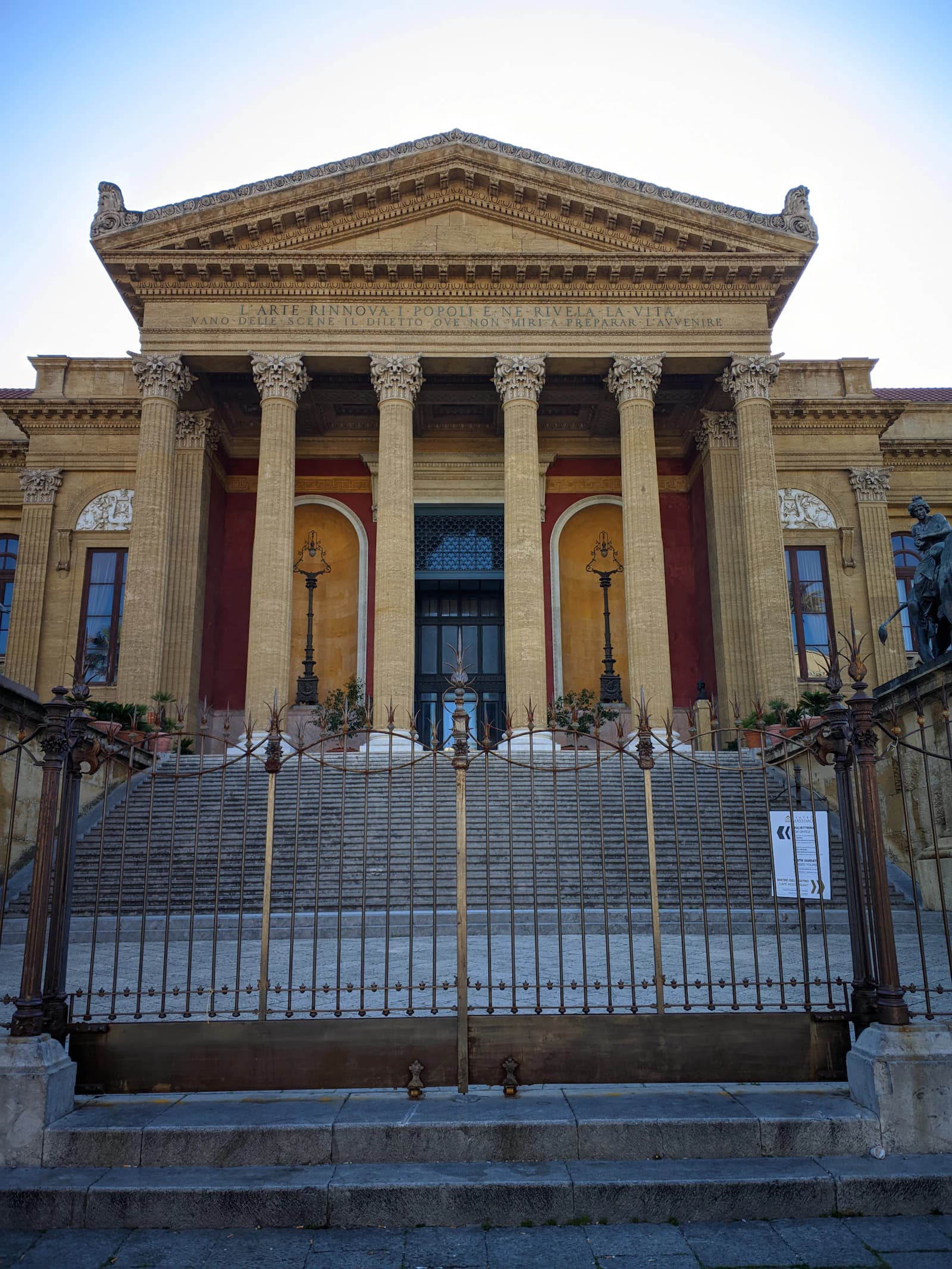 The monumental columned entrance of Teatro Massimo in Palermo
